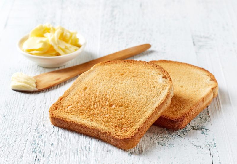 Two slices of toast with butter