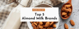 A bowl of almonds next to a bottle of almond milk, looking at the top almond milk brands