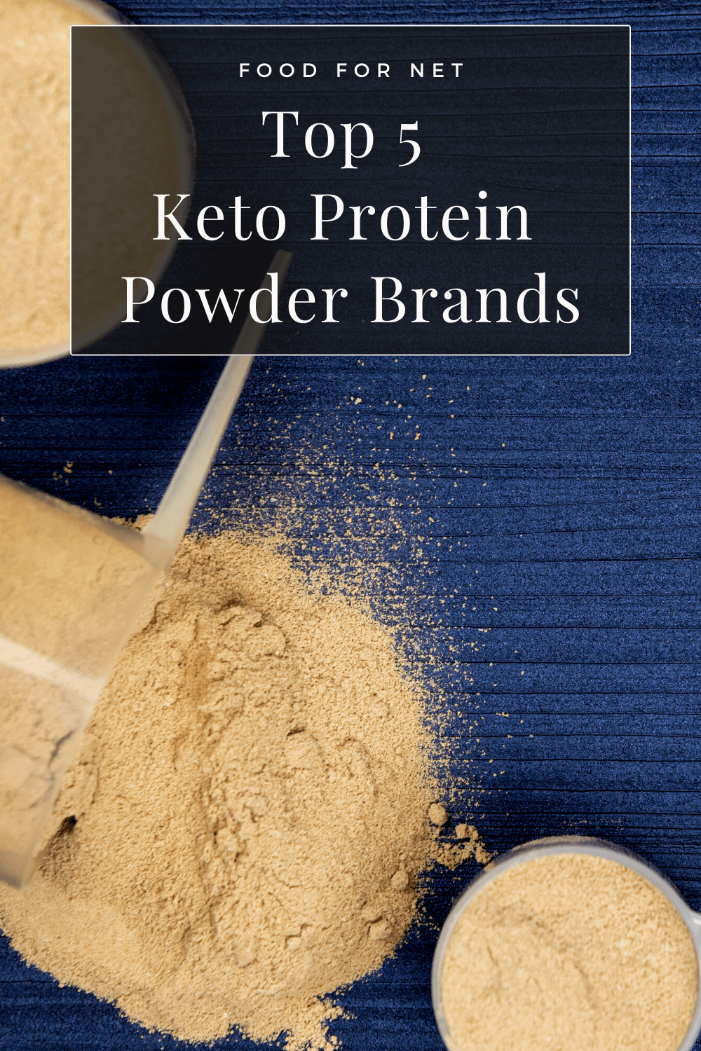 A dark blue background with scoops of keto protein powder, from the top brands, one of which has been tipped over