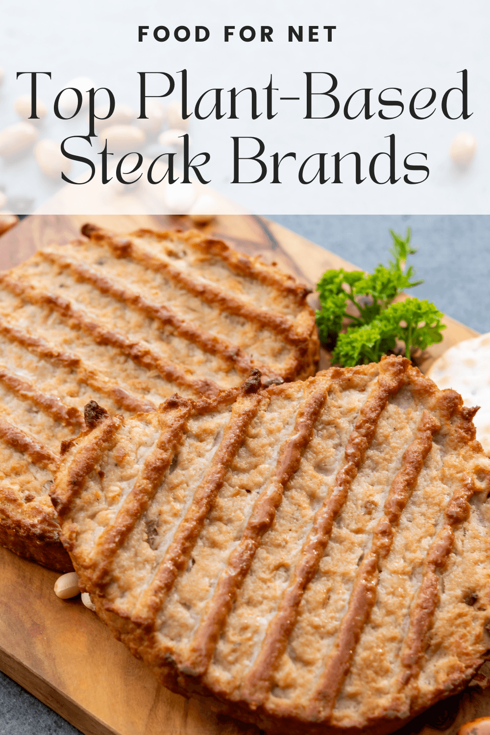 Two plant-based steaks on a wooden board, looking at the best brands