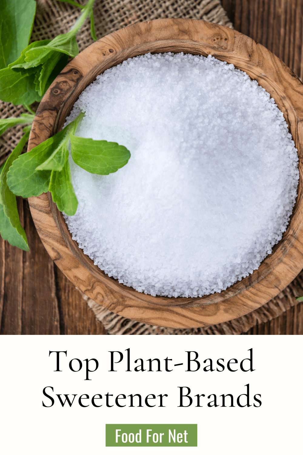 A brown bowl of stevia next to stevia leaves, highlighting the idea of the best plant-based sweetener brands