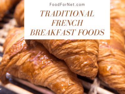 Various croissants on a table with slats