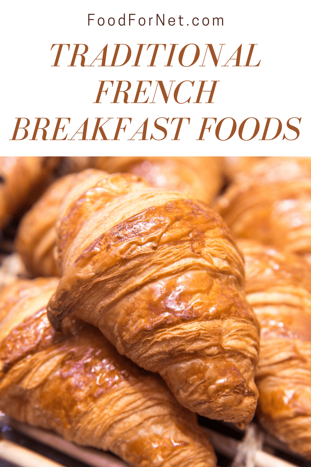 Various croissants on a table with slats