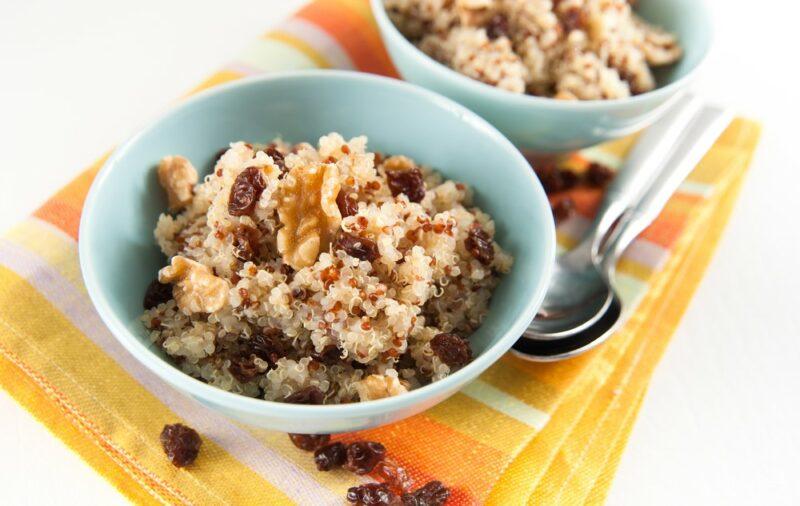 Two blue bowls with a quinoa breakfast