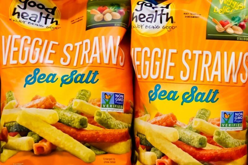 Two orange and red bags of sea salt veggie straws