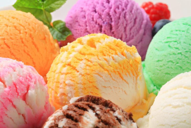 A selection of ice cream scoops of various colors