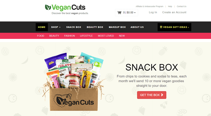 Vegan Cuts website screenshot showing a box from the company along with a range of snacks, against a light background with symbols of food.