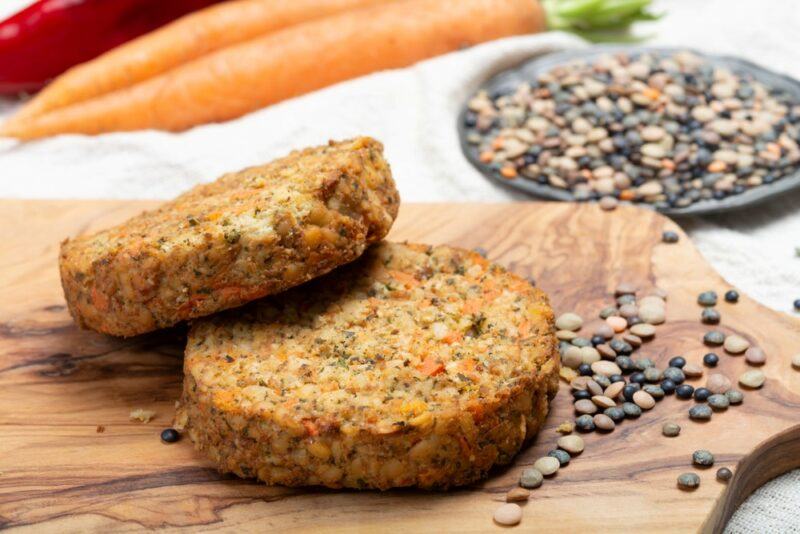 Two vegan patties that have been made with lentils