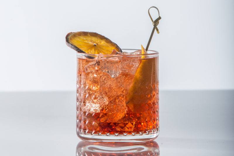 A Vieux Carre cocktail against a white background