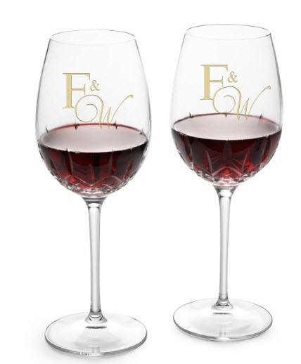Waterford Lismore Essence Red Wine Goblets | Food For Net Two goblets of red wine with golden engraving.