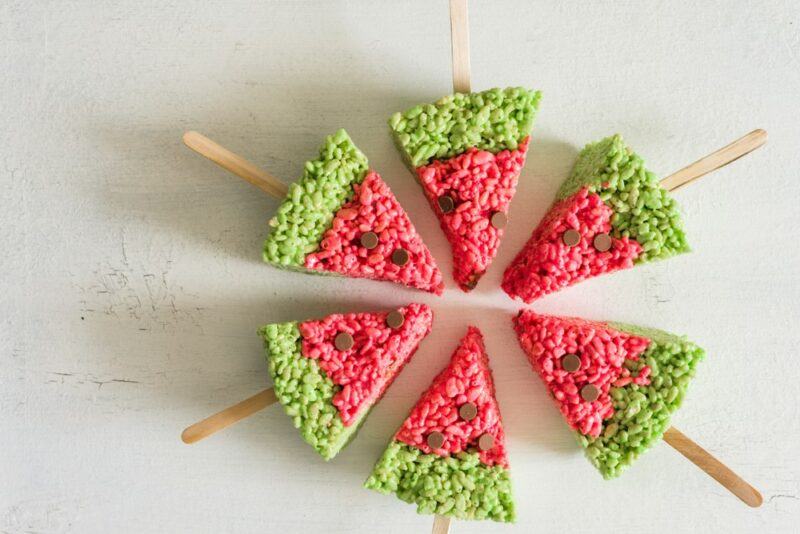 Six rice krispie snacks made to look like watermelon pieces