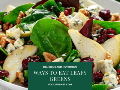 A salad with greens, pears, cheese and assorted other ingredients
