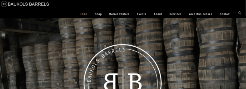 A website screenshot from Baukos Barrels showing the company's logo laid over many barrels.