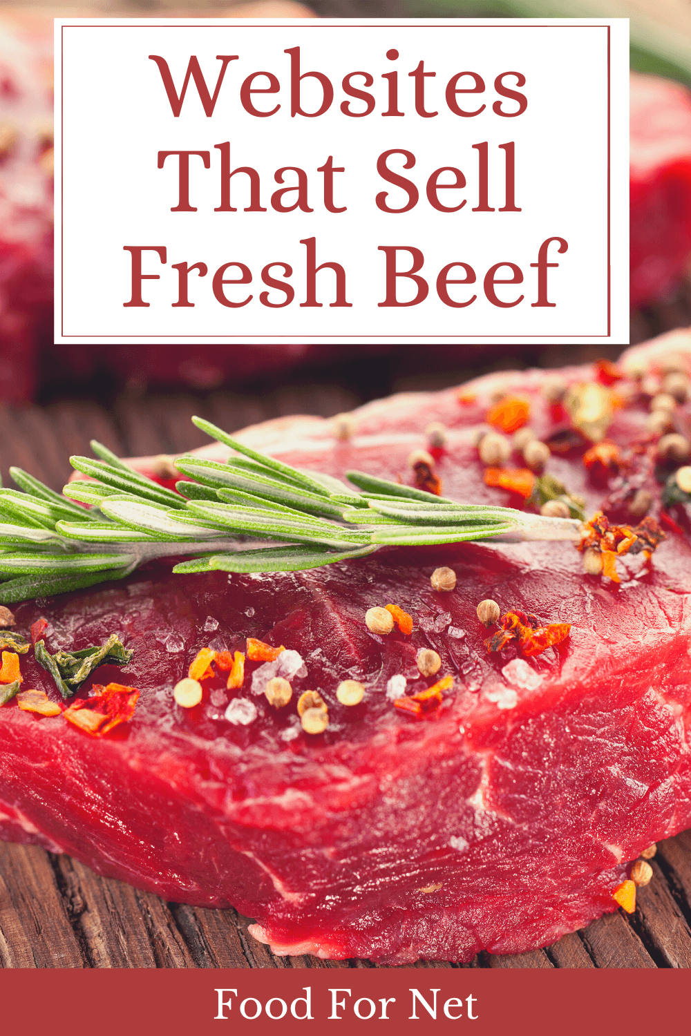 A piece of raw beef on a wooden table with another in the background