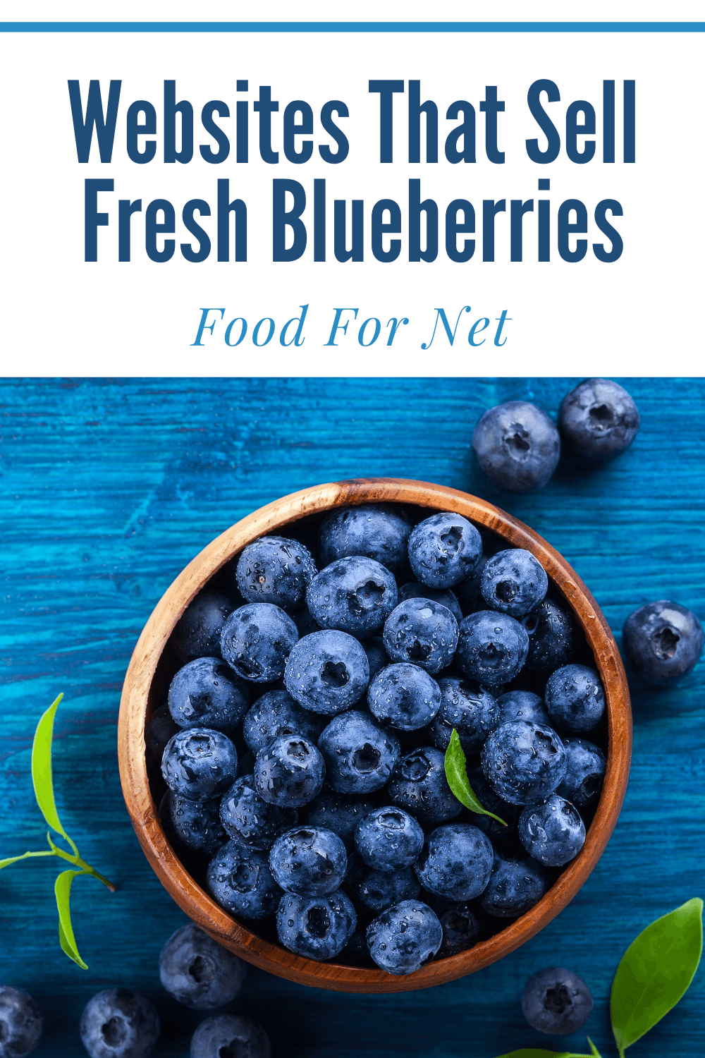 A brown bowl of blueberries on a blue table with a few berries scattered on the table