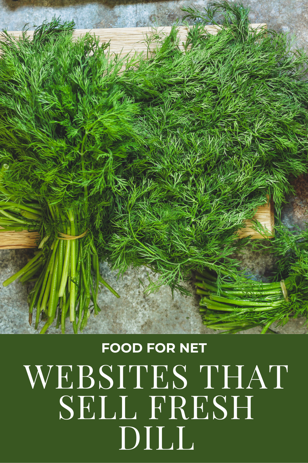 A selection of fresh dill bunches on a wooden board and a table