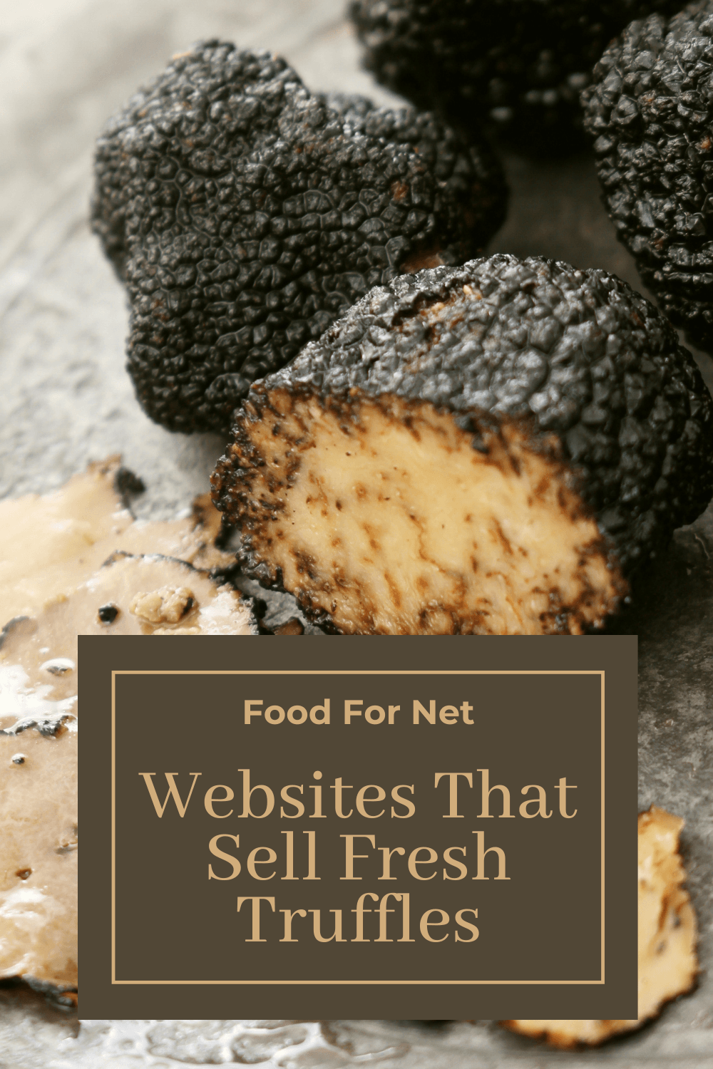 Fresh truffles on a gray table, one of which has been sliced