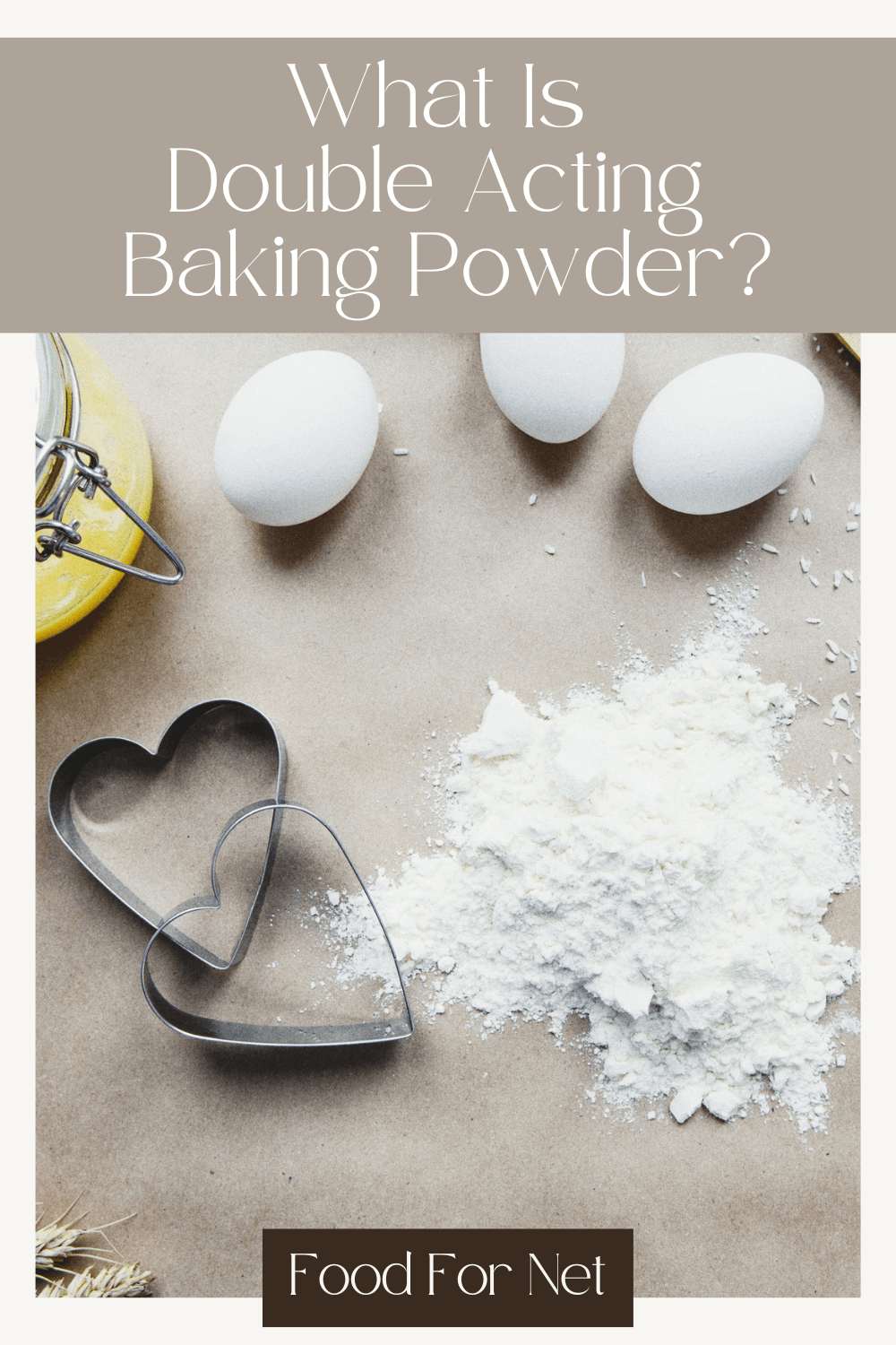 Baking ingredients and cookie molds on the table, including double acting baking powder