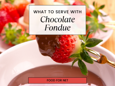 A large white bowl containing chocolate fondue, with fresh fruit and chocolate, highlighting the idea of what to serve with chocolate fondue