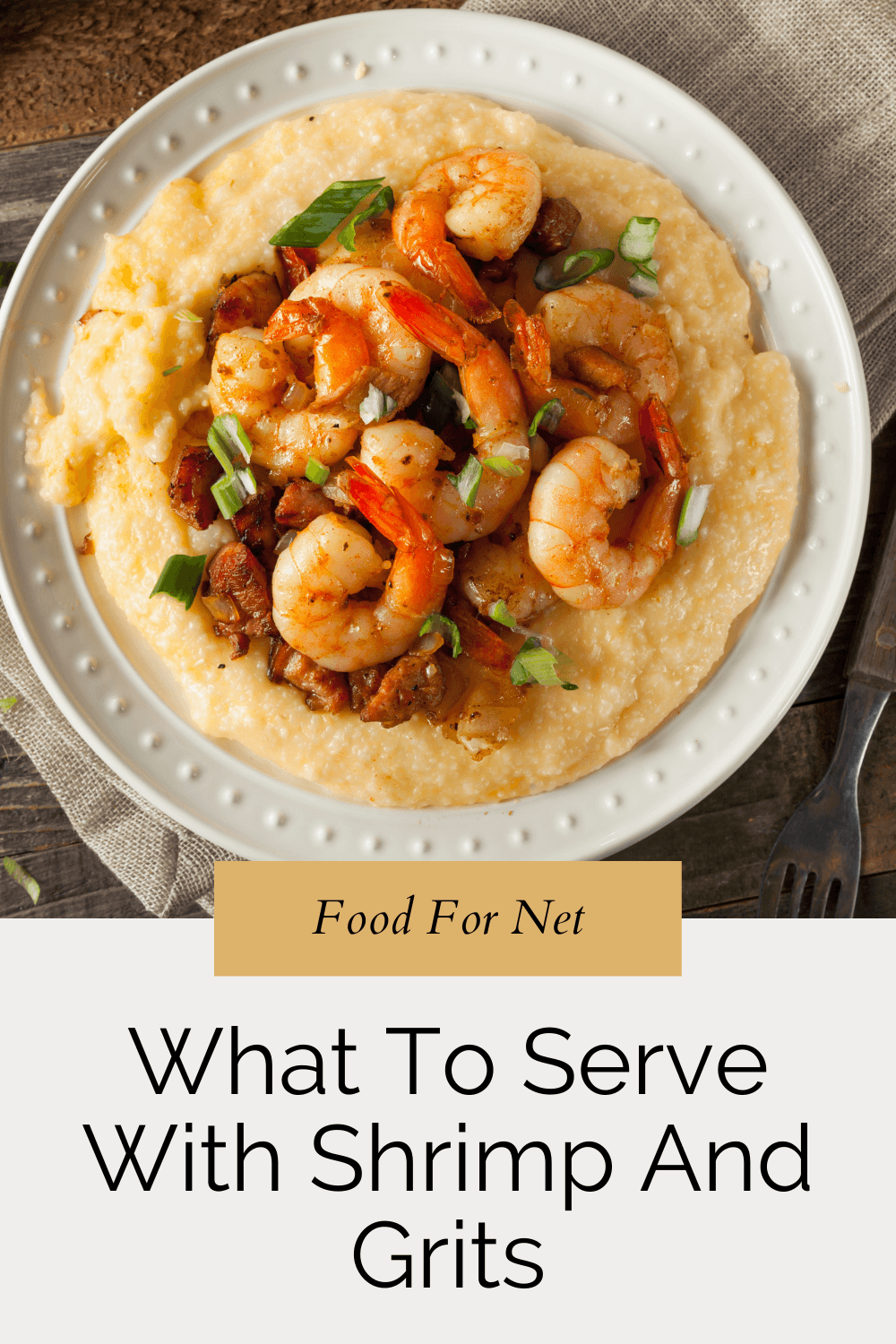 A large white bowl with grits topped with shrimp, highlighting the question of what to serve with shrimp and grits.