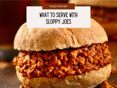 A single sloppy joe burger, filled with sloppy joe meat, highlighting the question of what to serve with sloppy joes