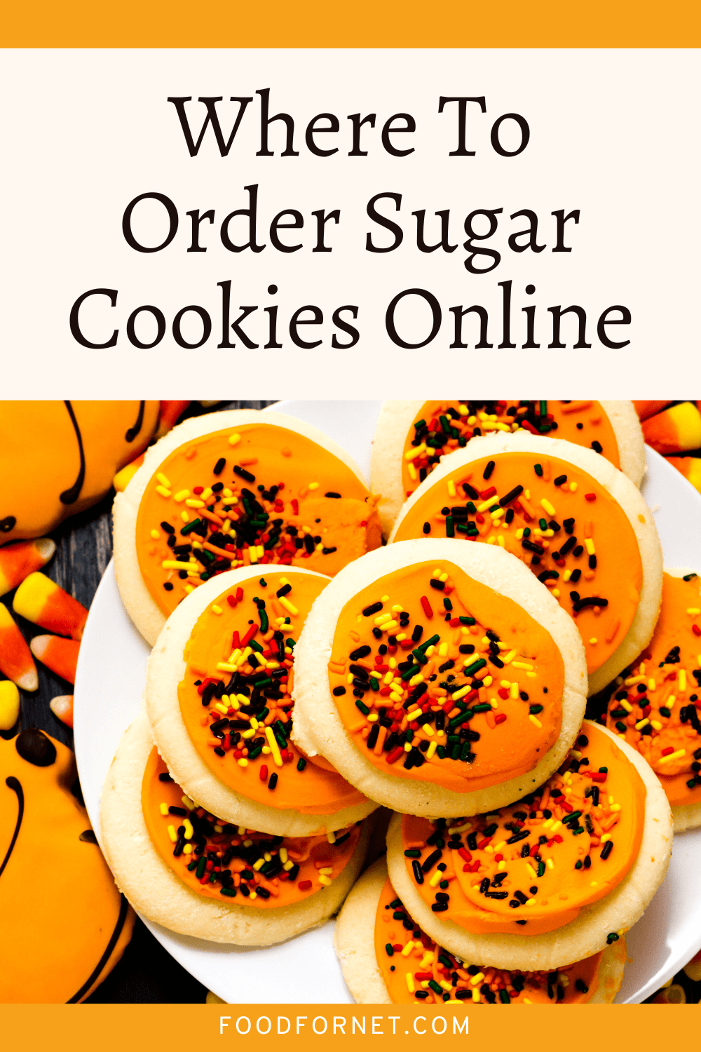 A pile of sugar cookies with orange icing and sprinkles, looking at where to order sugar cookies online