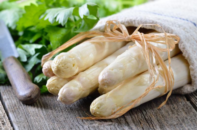 A bunch of white asparagus tied with a string