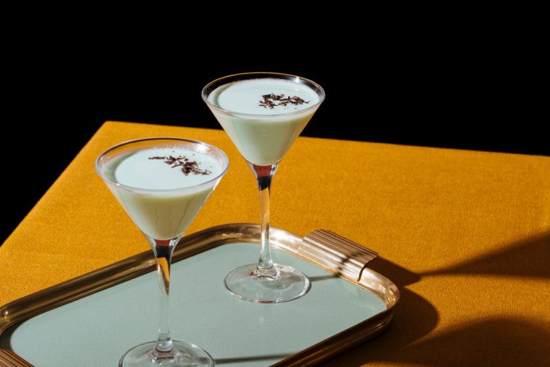 Two white chocolate grasshopper cocktails on a tray