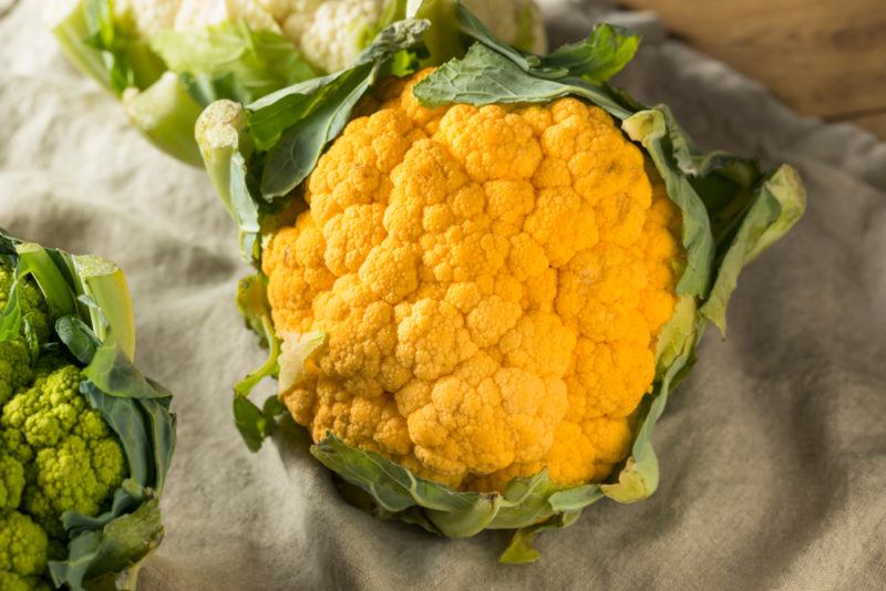 Yellow or orange cauliflower on a table