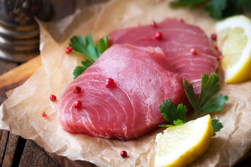 Raw yellowfin tuna on paper