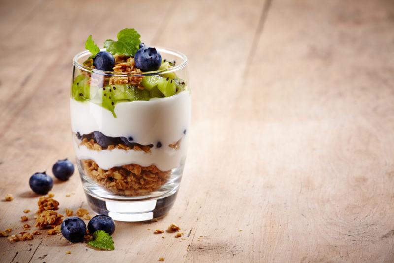 A yogurt parfait with berries and granola