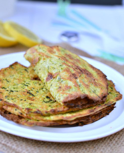 A white plate with zucchini tortillas