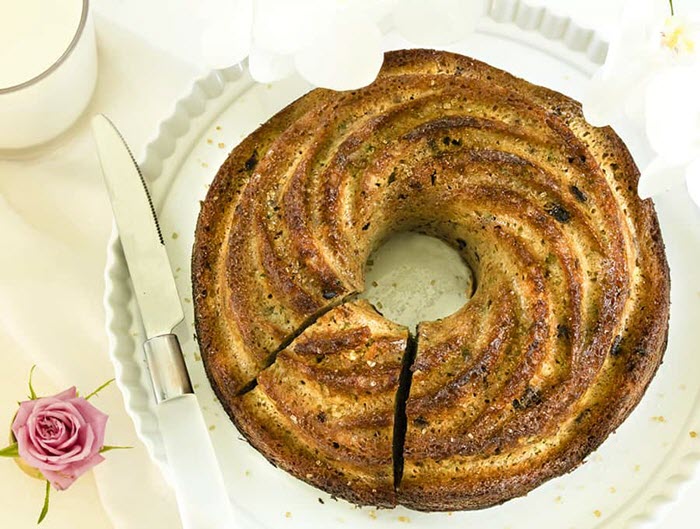 A circular loaf of walnut bread