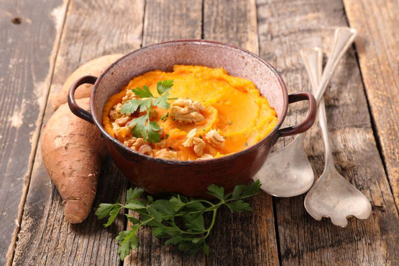 a bowl filled with sweet potato puree