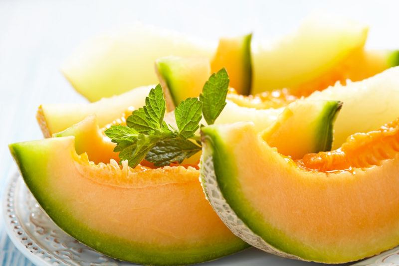 close up shot of slices of cantaloupe