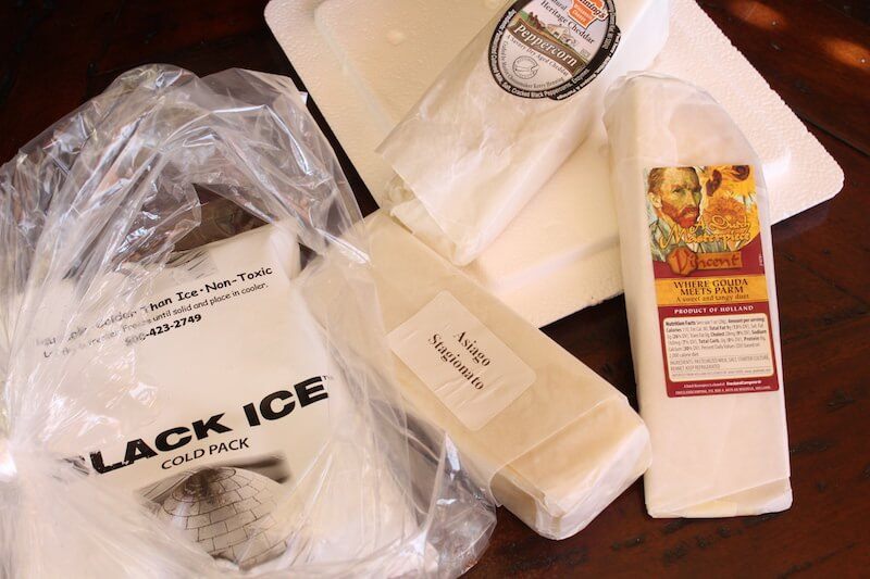 amazing clubs cheese of the month club first package with ice pack and three types of cheese