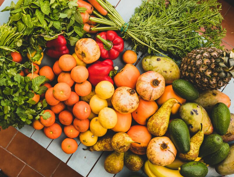 A colorful platter of fruits and vegetables to represent the best low FODMAP protein powder 