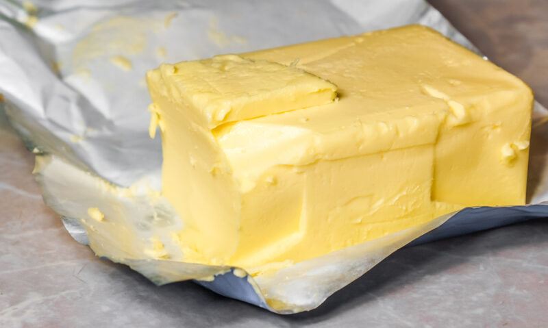 closeup image of a butter still in its wrapper