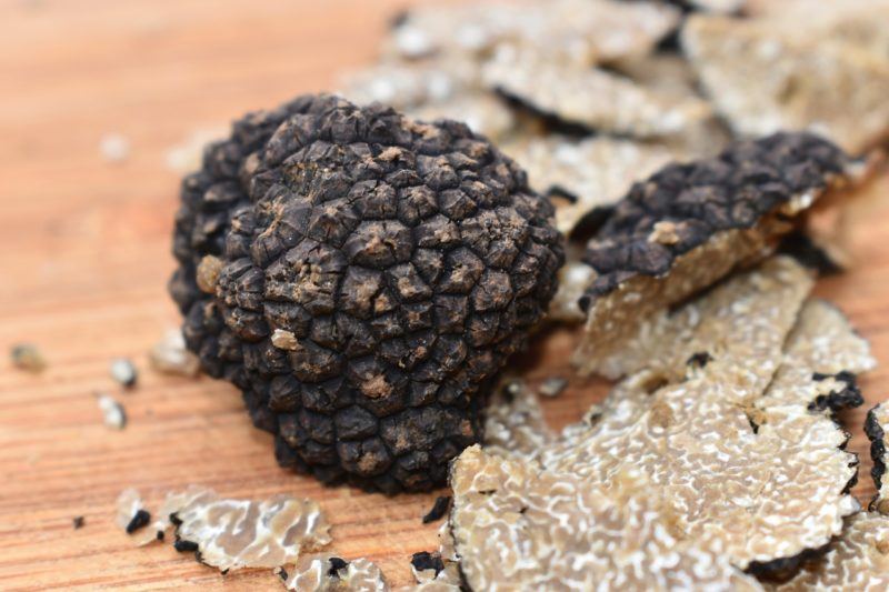 a broken up black truffle to represent where to buy fresh truffles online 