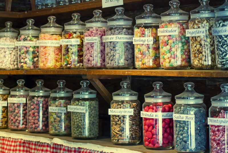 old-timey candy shoppe with jars of different types of sweets you can get in a candy of the month club