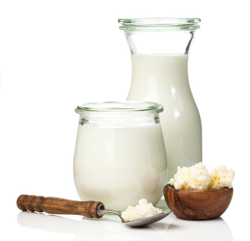 canstockphoto53868493 | Food For Net two glass bottles of kefir on a white background