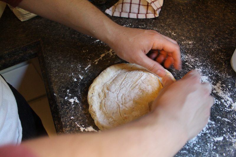 making herbed pizza dough crust by hand