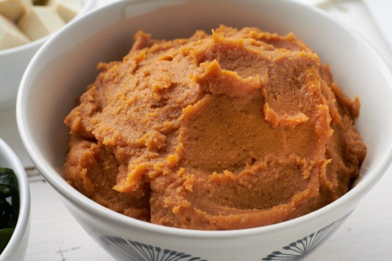 a closeup image of bowl with miso paste