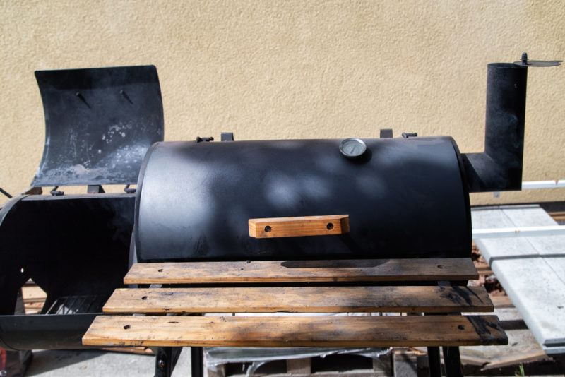 offset barrel smoker with fire box open