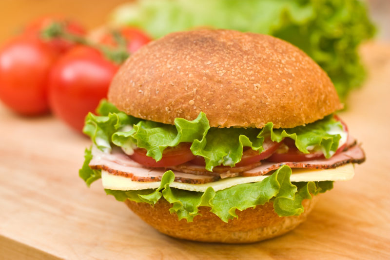 Smoked ham, lettuce and tomato sandwich. 