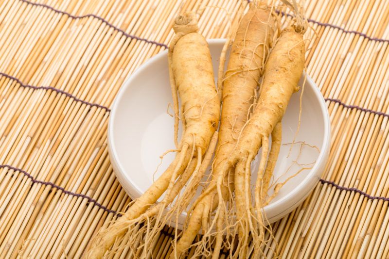 three pieces of ginseng ona white plate