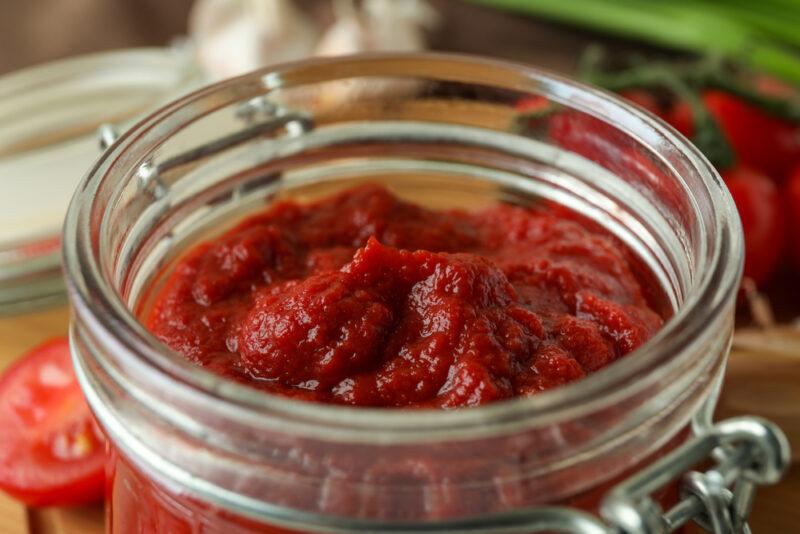 closeup image of a jar of tomato paste