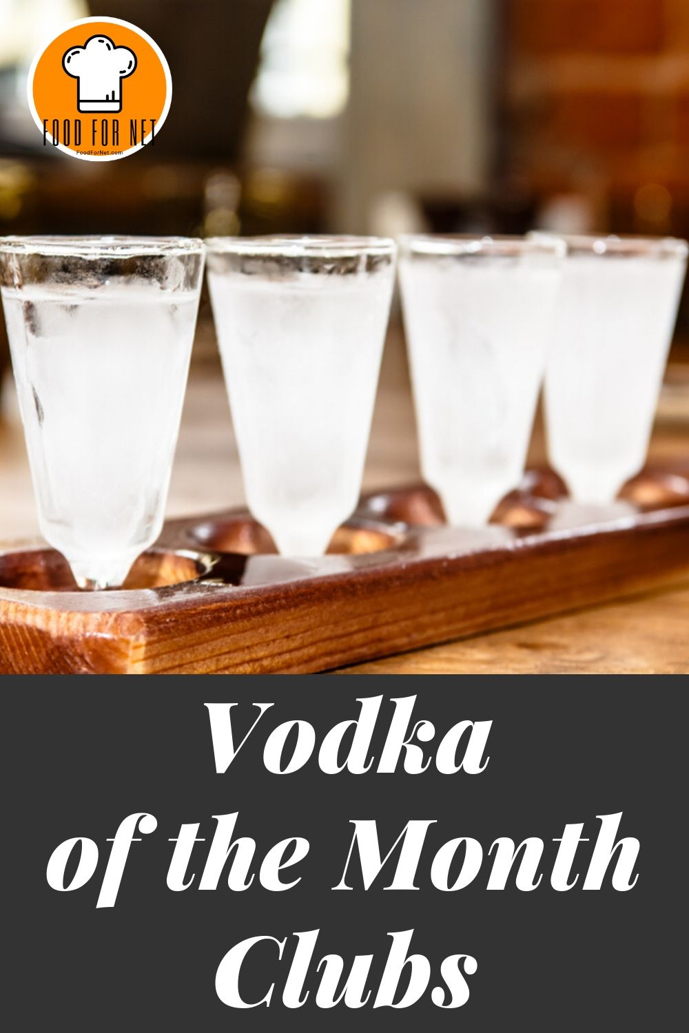 snifter glasses lined up on wooden board filled with quality russian vodka