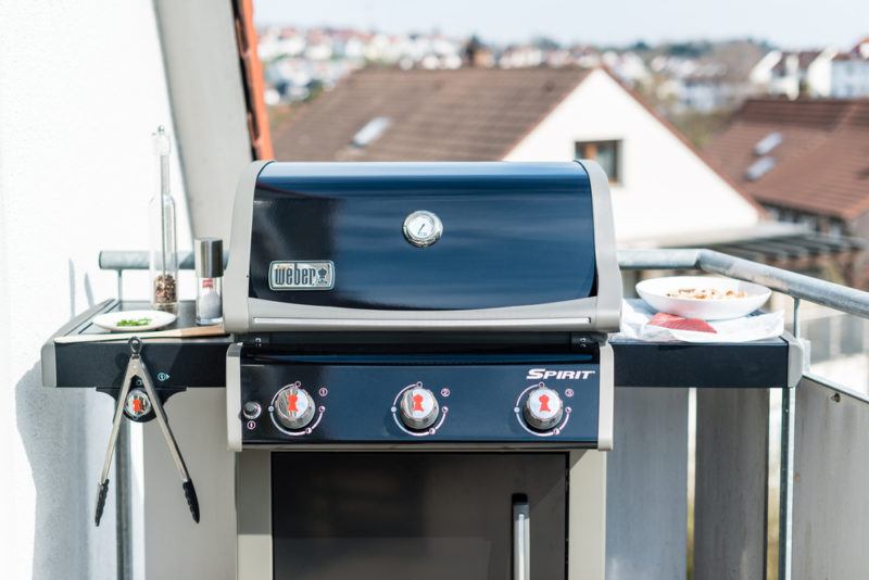 weber 3-burner gas grill on small balcony in germany