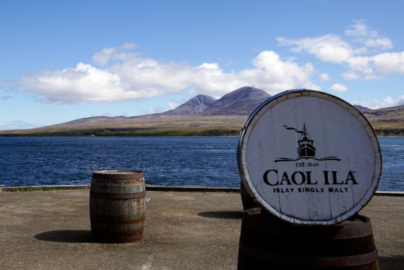 whiskey barrel top with print writing of caol ila islay single malt and logo